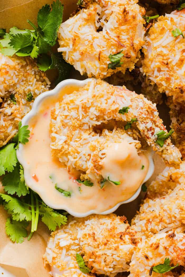 Sweet and Crispy Air Fryer Coconut Shrimp easily made in under 20 minutes and served with the most delicious chili dipping sauce! This appetizer is always a crowd-pleaser, but also makes a filling main dish served with a salad, veggies or in a wrap.