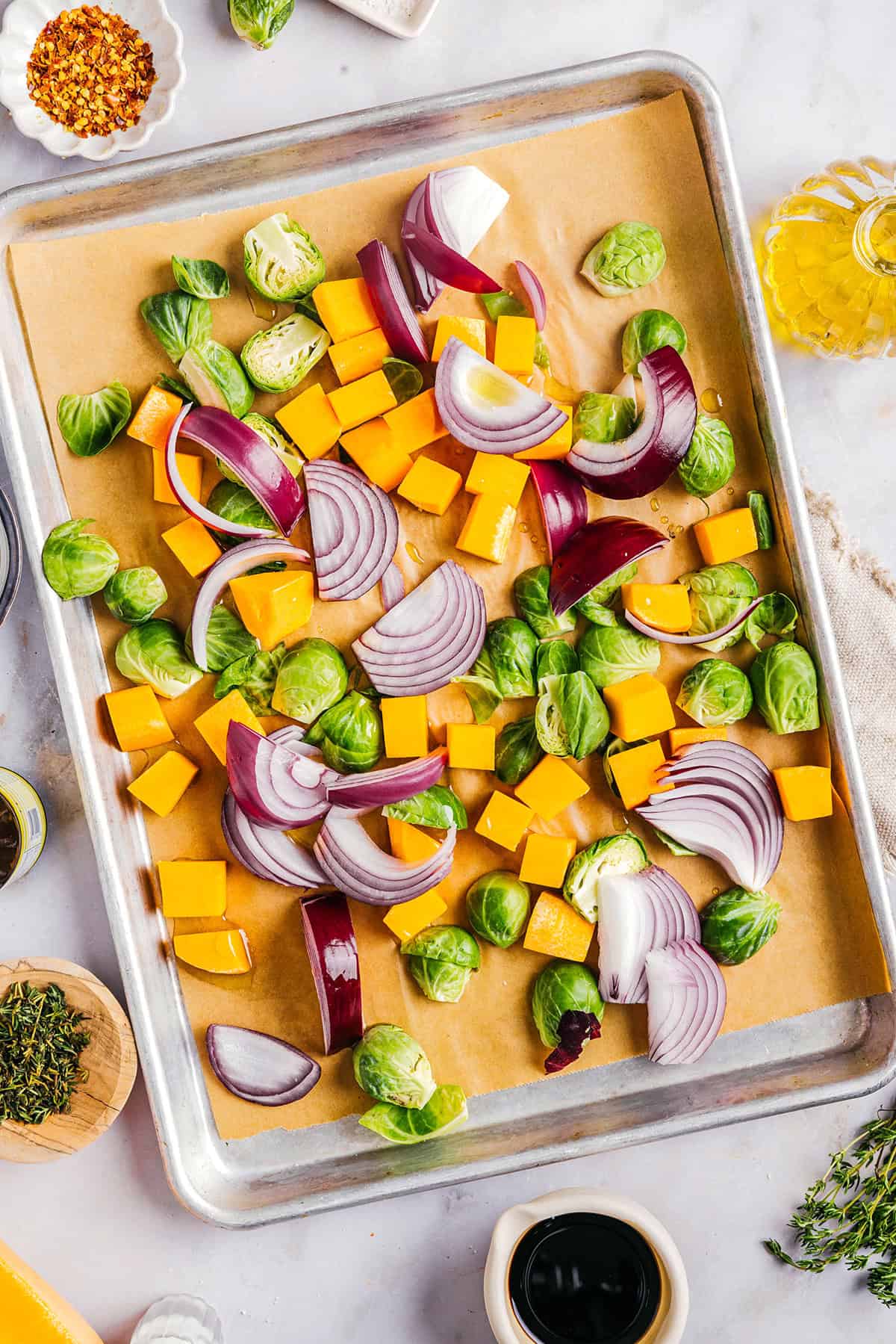 This Sheet Pan Maple Glazed Chicken with Vegetables is healthy, delicious and easily made all on one pan in just 30 minutes! The most flavorful weeknight dinner that is perfect for your fall meal prep!