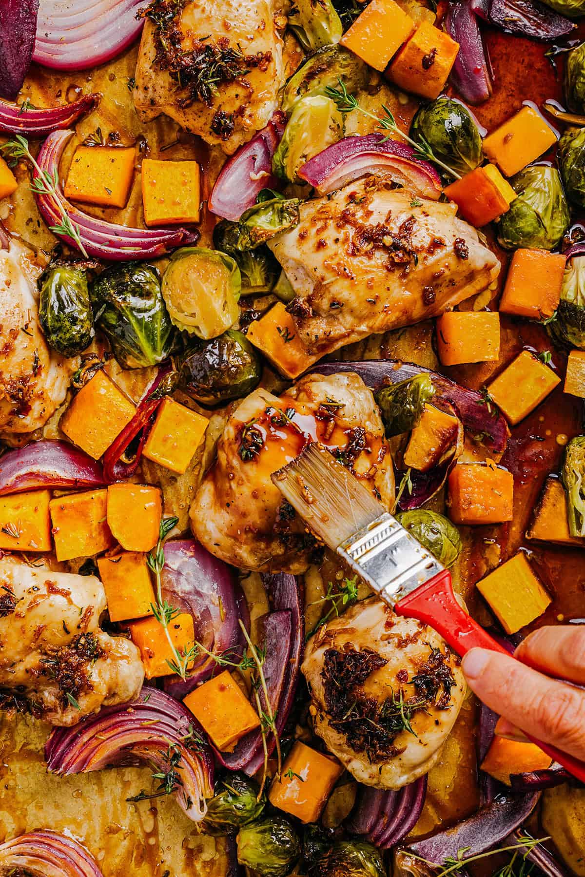 This Sheet Pan Maple Glazed Chicken with Vegetables is healthy, delicious and easily made all on one pan in just 30 minutes! The most flavorful weeknight dinner that is perfect for your fall meal prep!
