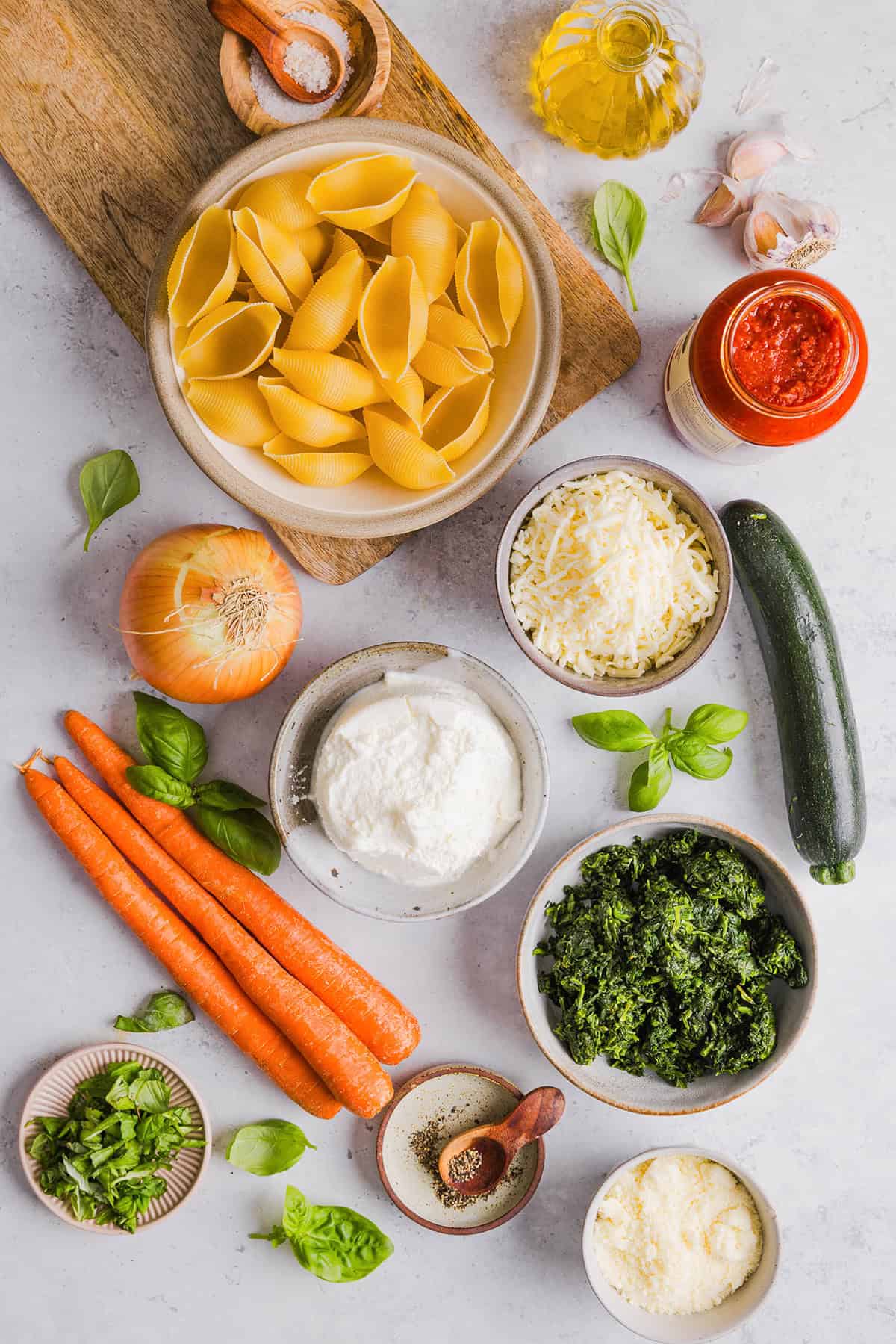 These cozy Veggie and Cheese Stuffed Shells are a family favorite that are loaded with vegetables, easy to freeze and make the perfect weeknight meal! The ultimate comfort food with a healthy twist!