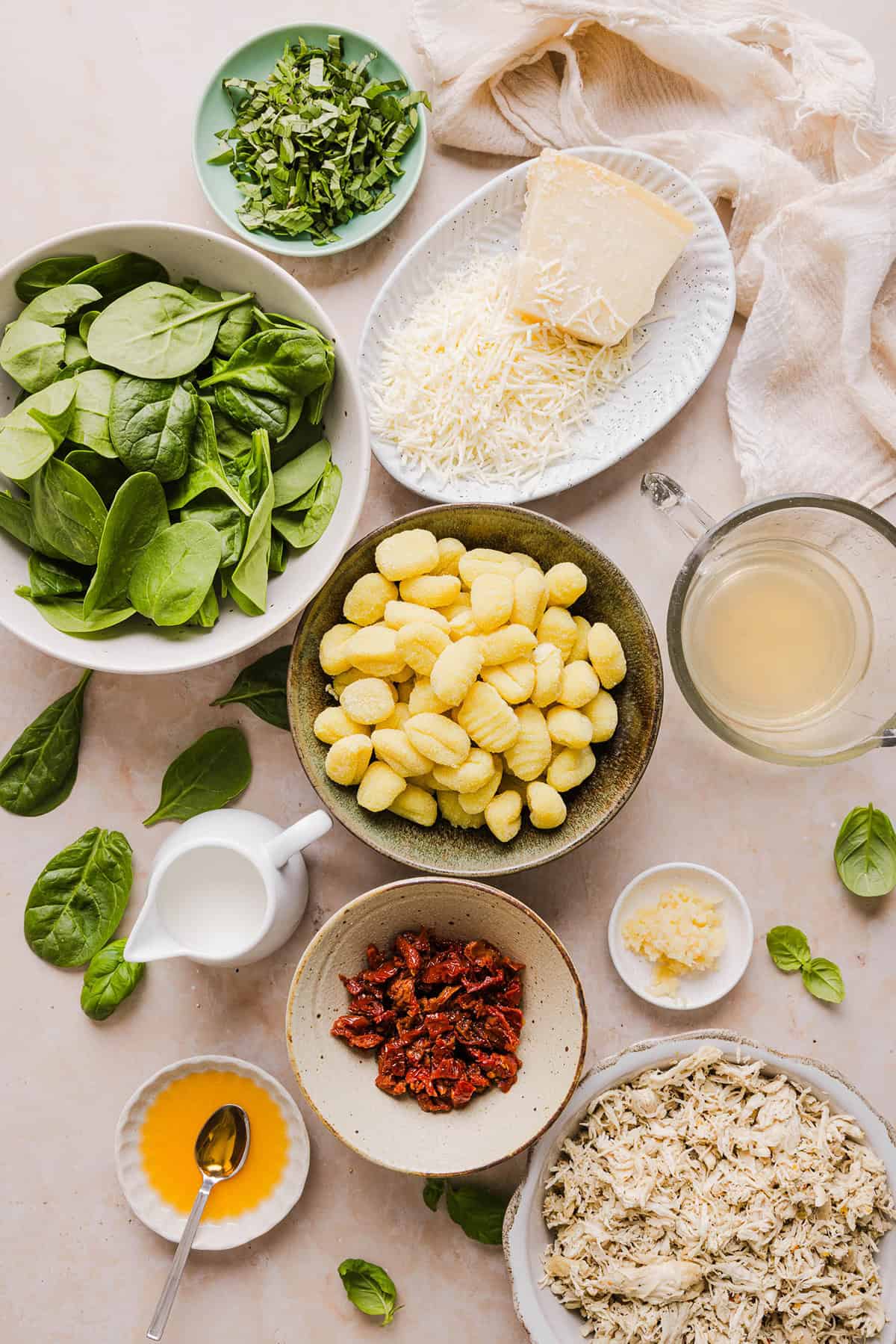 This EASY One Pan Marry Me Chicken and Gnocchi is the perfect weeknight meal! Pillowy soft gnocchi and tender chicken simmered together in a creamy sun dried tomato and parmesan sauce in just 20 minutes!